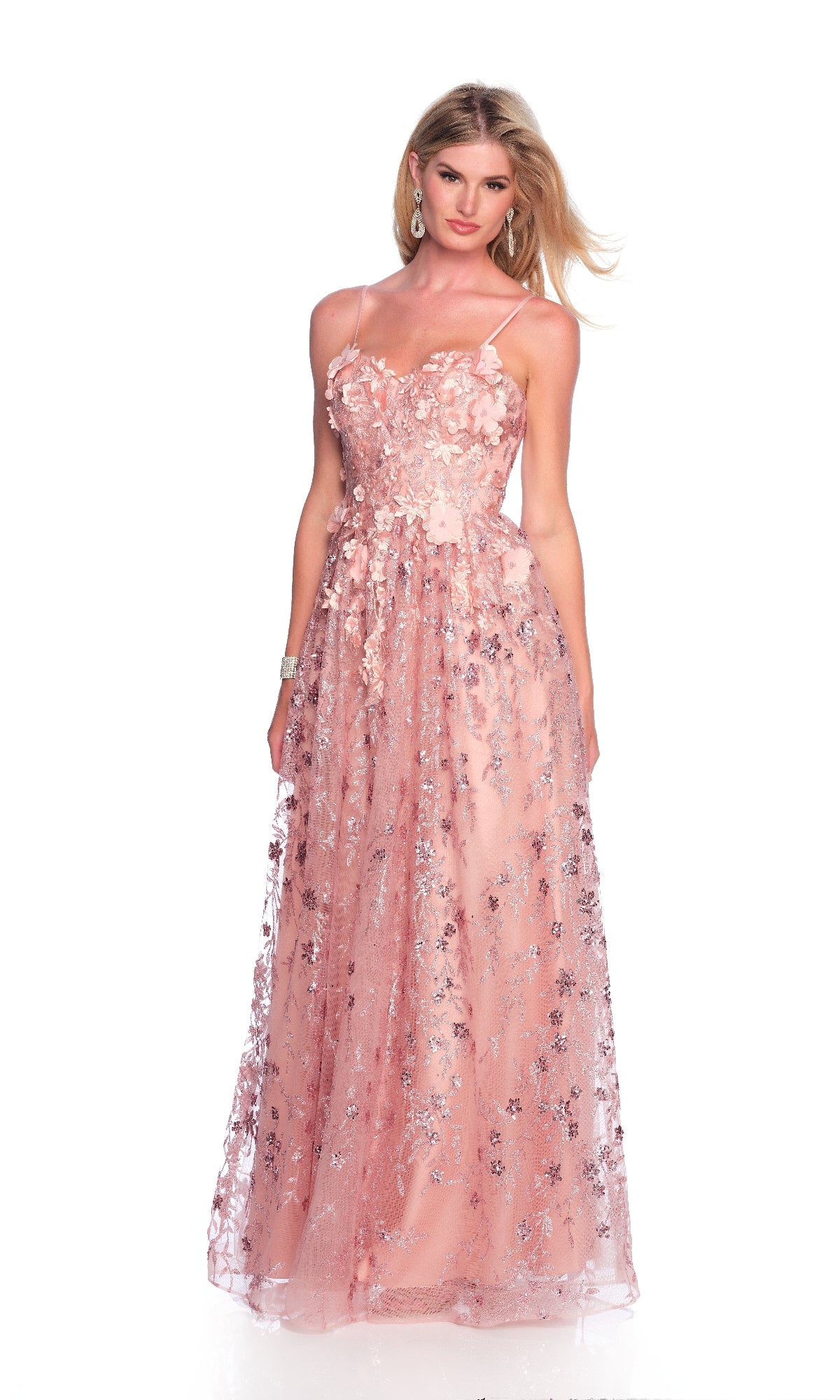 A woman wears the Long Pink Prom Dress: Dave & Johnny 11998, featuring a sweetheart neckline, thin straps, and embroidered 3D flowers, standing against a white background.